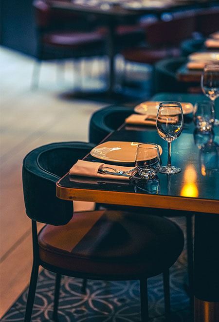 Elegant table setting at Nusr-Et New York Midtown, featuring fine glassware and a sophisticated ambiance for private dining and events.